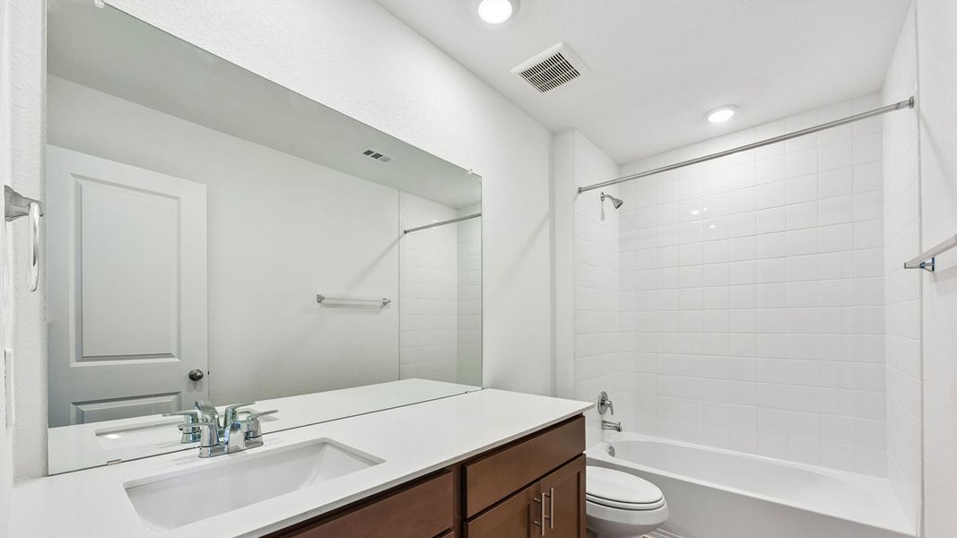 Furnished interior view inside a new home in Valverde, Bastrop (Image 15).