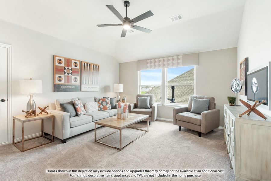 Living room with vaulted ceiling, ceiling fan, gray sofa, two accent chairs, and carpet flooring Living room with vaulted ceiling, ceiling fan, gray sofa, two accent chairs, and carpet flooring