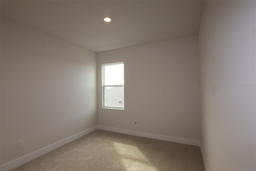 Spacious, unfurnished interior of a new home in Waterset Tradition Series, Apollo Beach (Image 22).