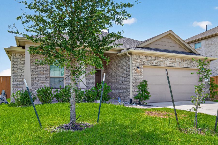 Front exterior of a new home in Marvida, Cypress, TX, highlighting curb appeal (Image 30).