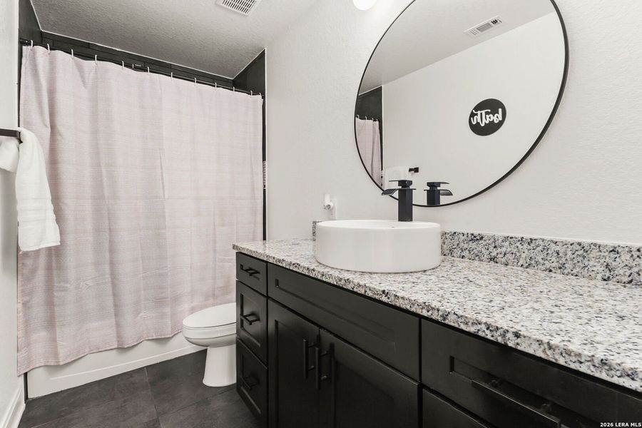 Furnished interior view inside a new home in , Elmendorf (Image 7).