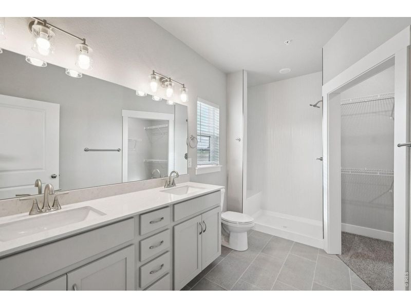 Furnished interior view inside a new home in Highlands at Fox Hill - The Flats, Longmont (Image 5).