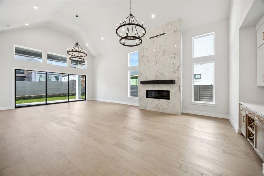 Hosting family and friends in this over the top open concept family-dining area is a dream come true!