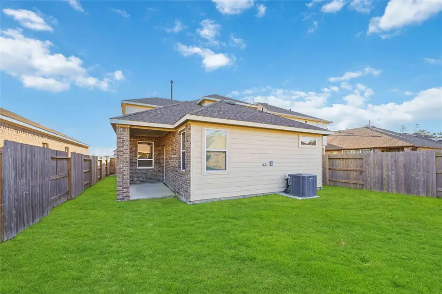Exterior details and patio area of a home in , Houston (Image 4).