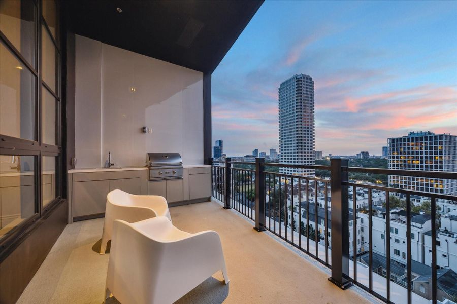 The balcony offers space for relaxing and stargazing. The summer kitchen has gas grill, sink and storage beneath. The balcony offers space for relaxing and stargazing. The summer kitchen has gas grill, sink and storage beneath.