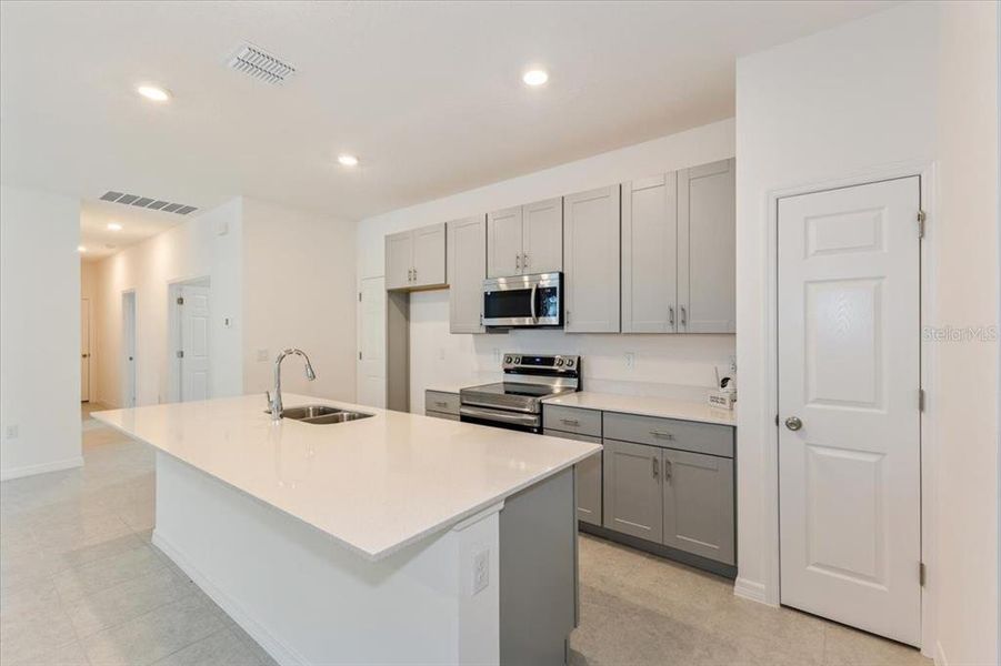 Furnished interior view inside a new home in Liberty Station, Orange City (Image 5).