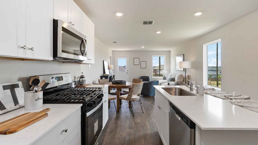 Representative furnished interior of a home built from the Atlanta by D.R. Horton in Watermark, Alvin (Image 7).
