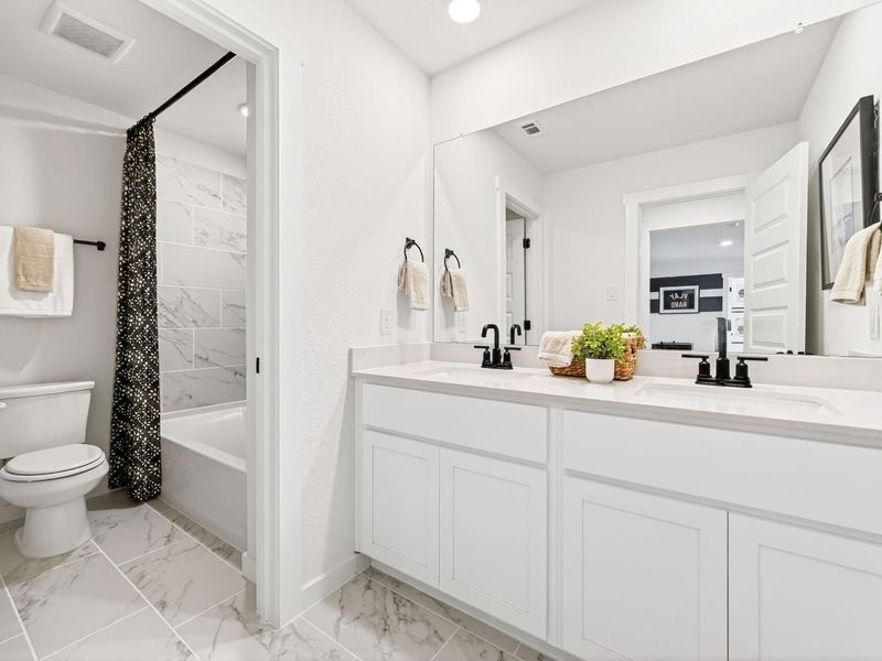 Furnished interior view inside a new home in Parks at Foster Crossing, Anna (Image 36).