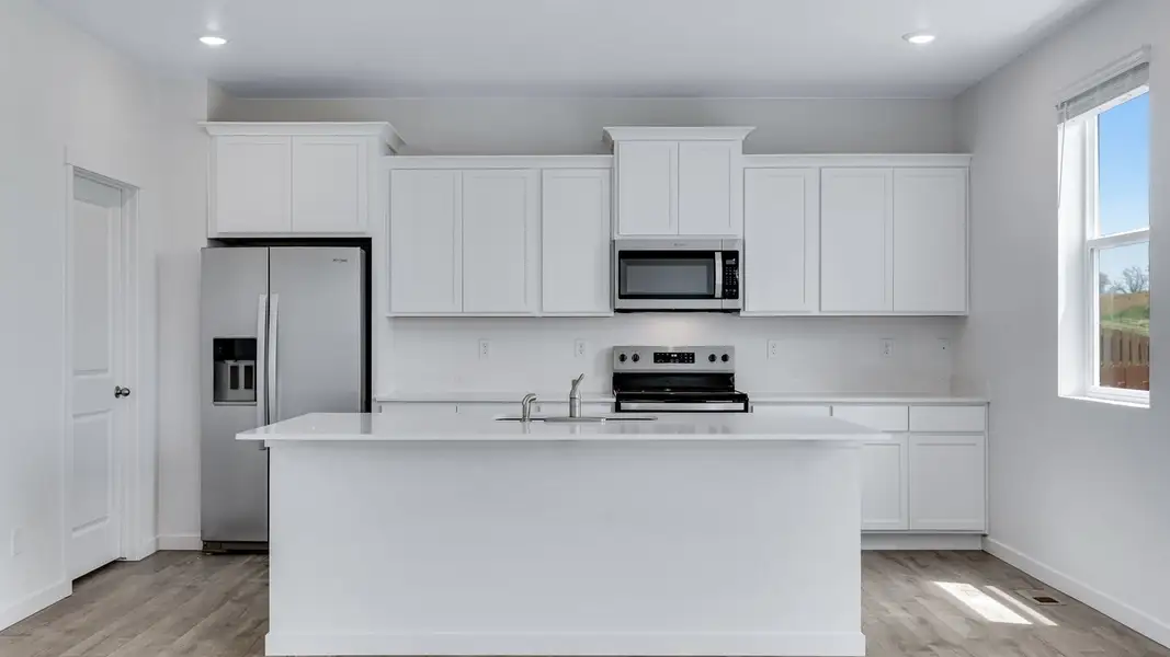 Furnished interior view inside a new home in Vista Meadows, Fort Lupton (Image 4).