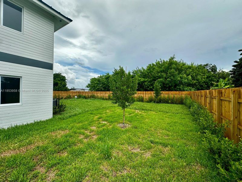 Front exterior of a new home in , Florida City, FL, highlighting curb appeal (Image 16). Front exterior of a new home in , Florida City, FL, highlighting curb appeal (Image 16).