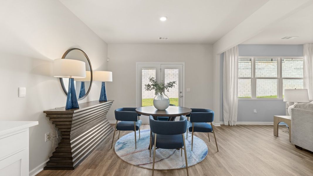 Representative furnished interior of a home built from the Halton by D.R. Horton in Brooks Station, Dacula (Image 14).