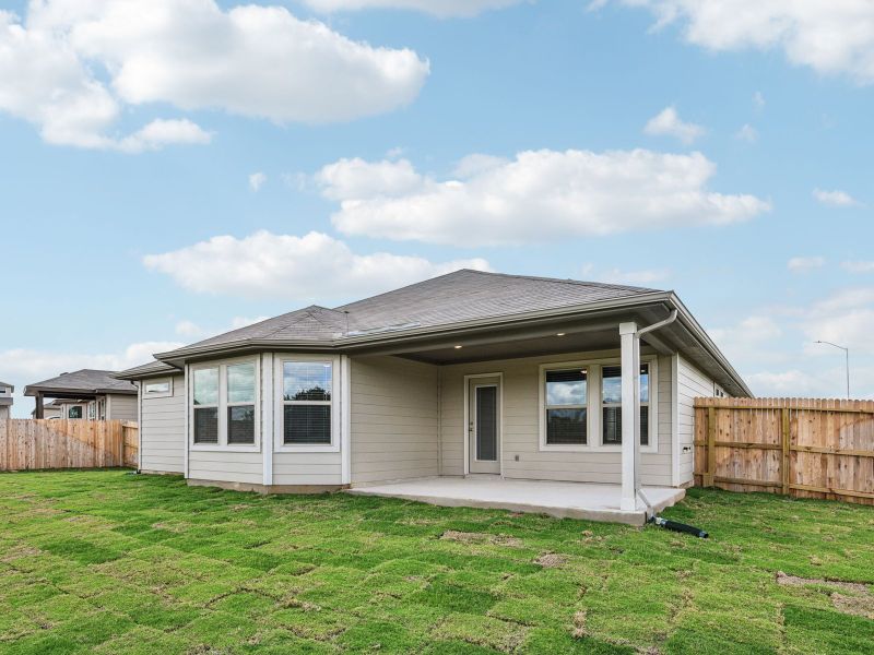 Back exterior of the Oleander floorplan at a Meritage Homes community.