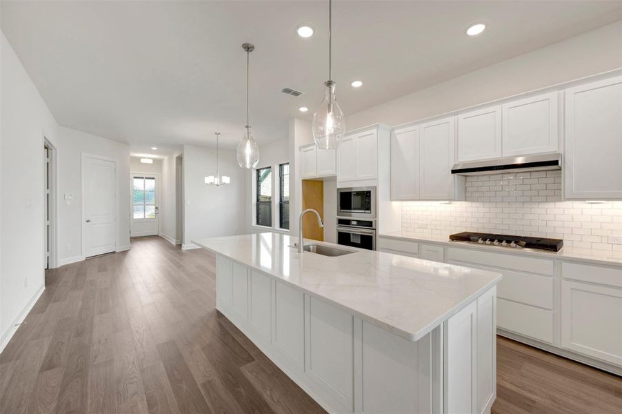 Furnished interior view inside a new home in Sienna - Grove Collection, Missouri City (Image 3).