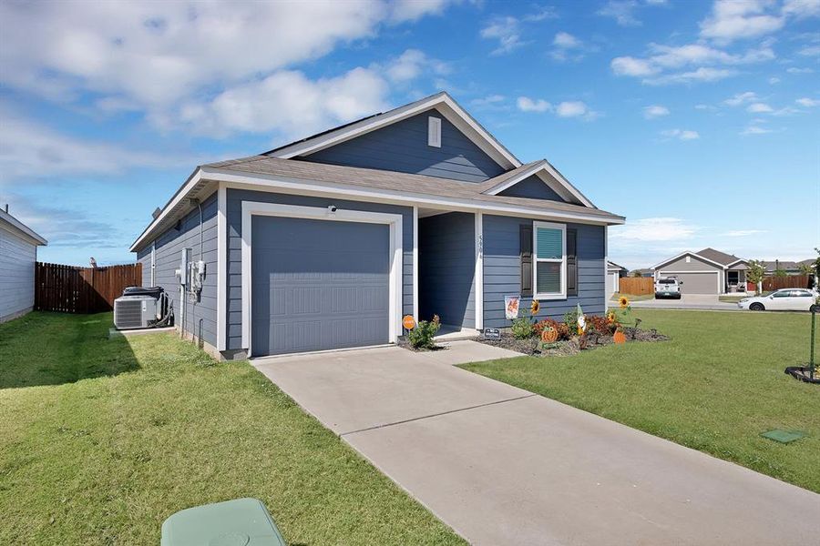 Front exterior of a new home in Bridgewater: Cottage Collection, Princeton, TX, highlighting curb appeal (Image 1). Front exterior of a new home in Bridgewater: Cottage Collection, Princeton, TX, highlighting curb appeal (Image 1).