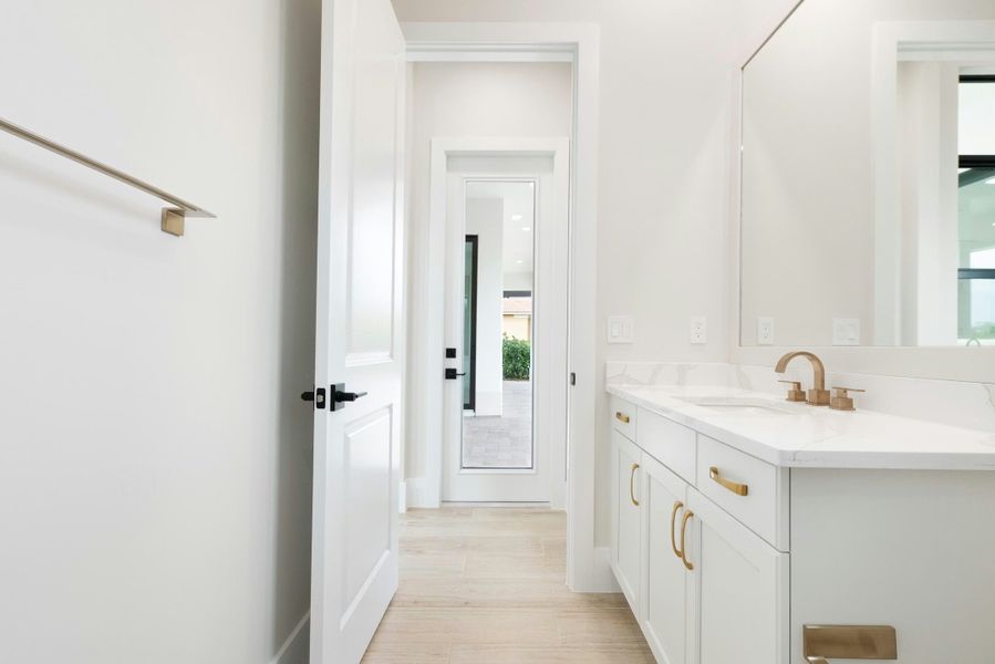 Representative furnished interior of a home built from the Madrona 58 by GHO Homes in Tesoro Club, Port St. Lucie (Image 16).