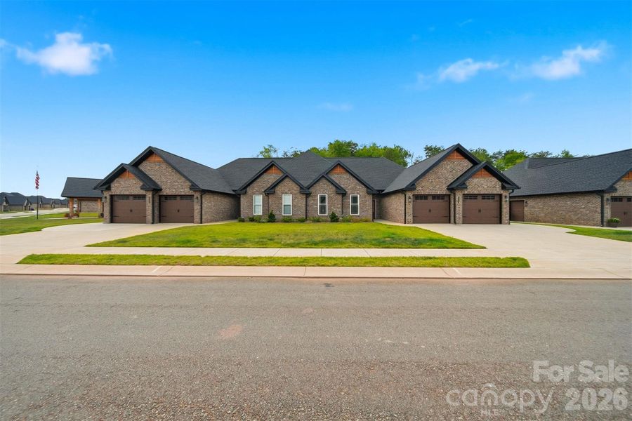 Front exterior of a new home in , Hickory, NC, highlighting curb appeal (Image 18).