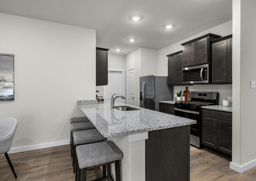 The kitchen has a wonderful breakfast bar. The kitchen has a wonderful breakfast bar.