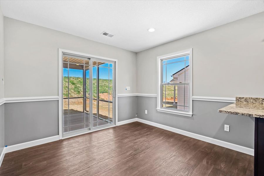 Representative unfurnished interior of a home built from the Wellford by Enchanted Homes in Hampshire Heights, Moore (Image 15).