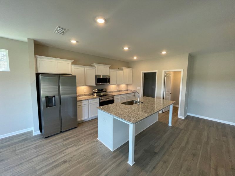 Furnished interior view inside a new home in Brandon Woods, Spring Hill (Image 7).