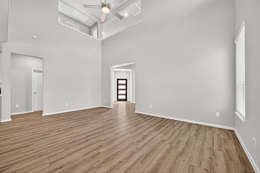 Spacious, unfurnished interior of a new home in Sunterra, Katy (Image 19).
