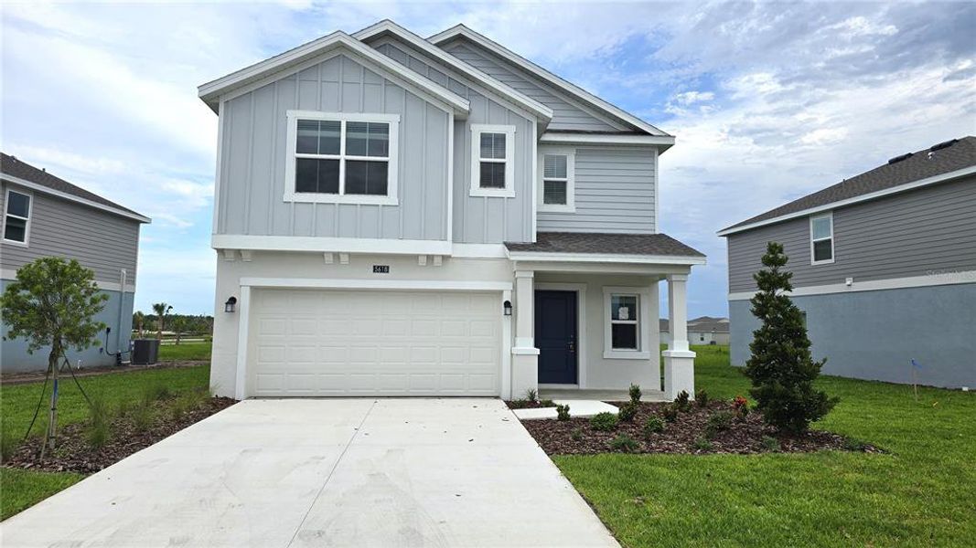 Front exterior of a new home in Westview, Kissimmee, FL, highlighting curb appeal (Image 16). Front exterior of a new home in Westview, Kissimmee, FL, highlighting curb appeal (Image 16).
