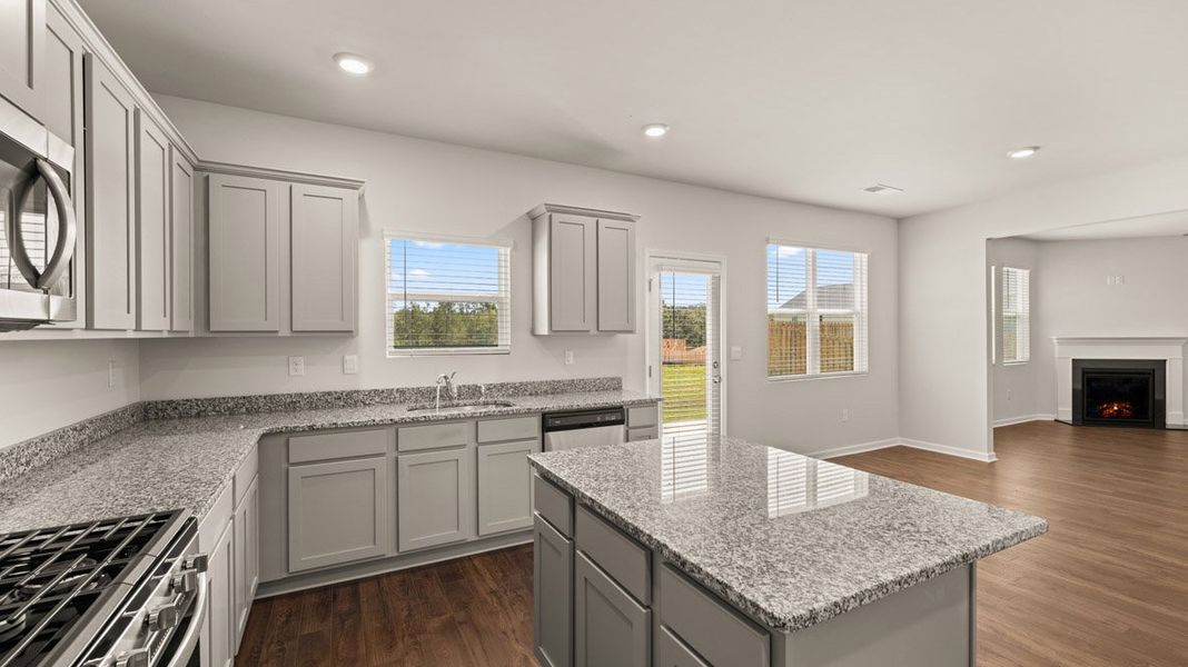 Representative furnished interior of a home built from the Grayson by D.R. Horton in Highland Hills, Graniteville (Image 6).