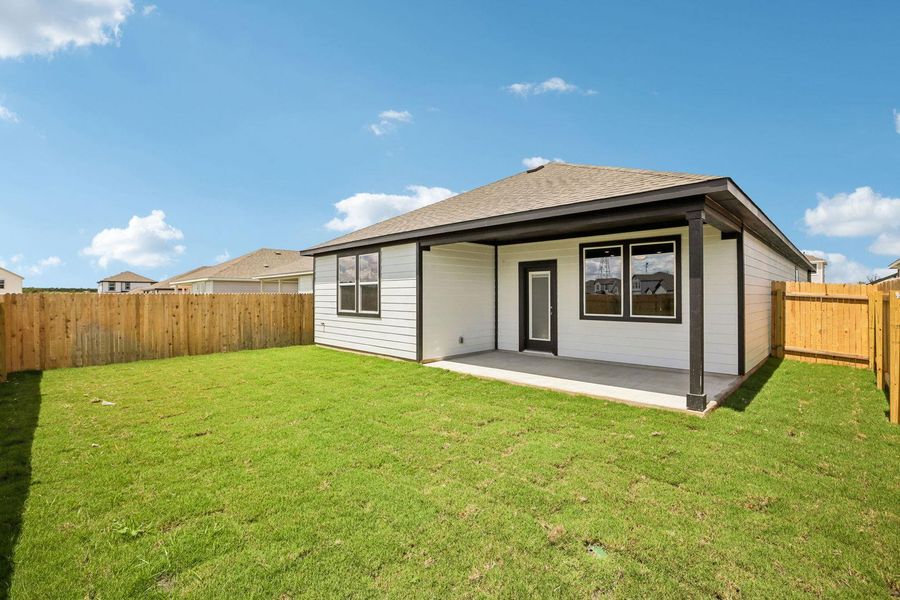 Exterior details and patio area of a home in Stallion Run, Buda (Image 3).