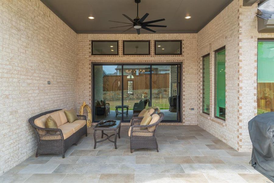 View of patio / terrace with outdoor lounge area, ceiling fan, and area for grilling