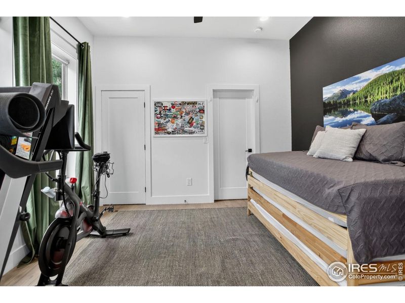 First floor bedroom 1, the door on the right connects to the Jack n Jill bathroom, the door on the left is the laundry closet. First floor bedroom 1, the door on the right connects to the Jack n Jill bathroom, the door on the left is the laundry closet.