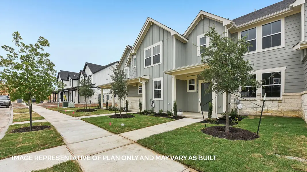 Front exterior of a new home in Avery Centre, Round Rock, TX, highlighting curb appeal (Image 2). Front exterior of a new home in Avery Centre, Round Rock, TX, highlighting curb appeal (Image 2).