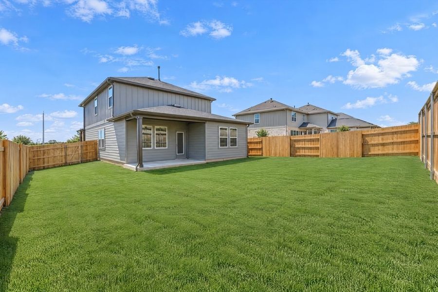 Exterior details and patio area of a home in Sunfield, Buda (Image 27).