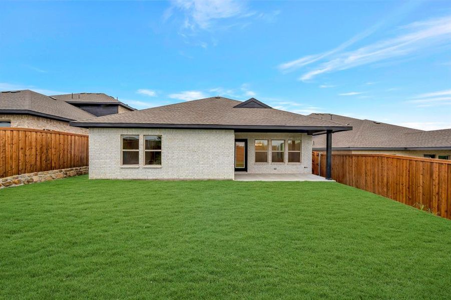 Exterior details and patio area of a home in Aspire at Noble Ridge, Howe (Image 22).