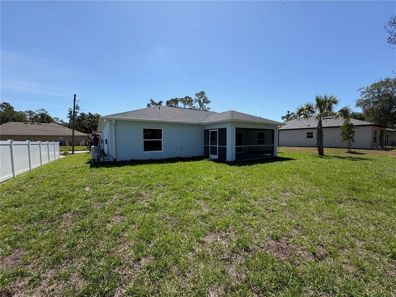 Exterior details and patio area of a home in , North Port (Image 23).
