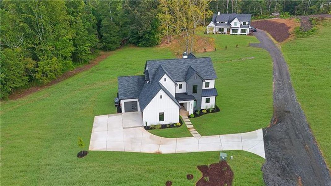 Front exterior of a new home in , Canton, GA, highlighting curb appeal (Image 31).