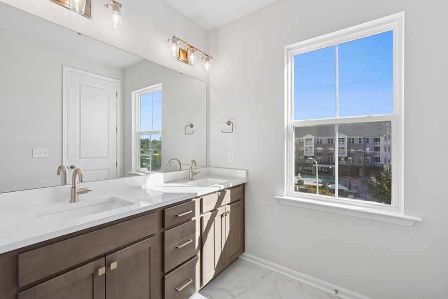 Representative furnished interior of a home built from the Nola by Tri Pointe Homes in The Grove at Latta Park, Durham (Image 6).