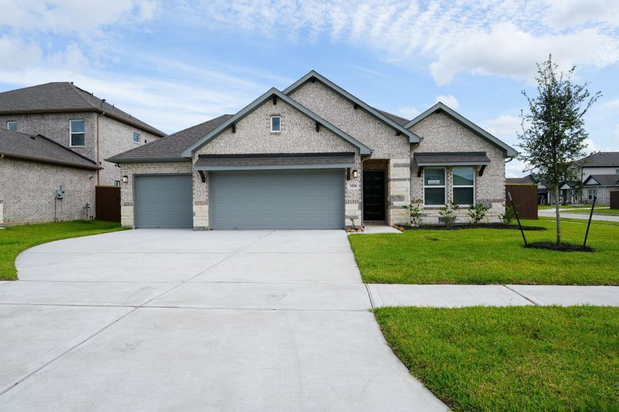 Front exterior of a new home in Foxtail Palms, Manvel, TX, highlighting curb appeal (Image 21).