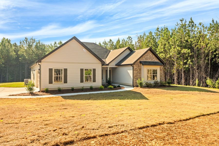 Front exterior of a new home in Mitchell Farms, LaGrange, GA, highlighting curb appeal (Image 1). Front exterior of a new home in Mitchell Farms, LaGrange, GA, highlighting curb appeal (Image 1).