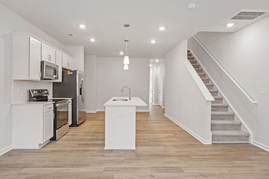 Furnished interior view inside a new home in Renaissance at White Oak, Garner (Image 5).