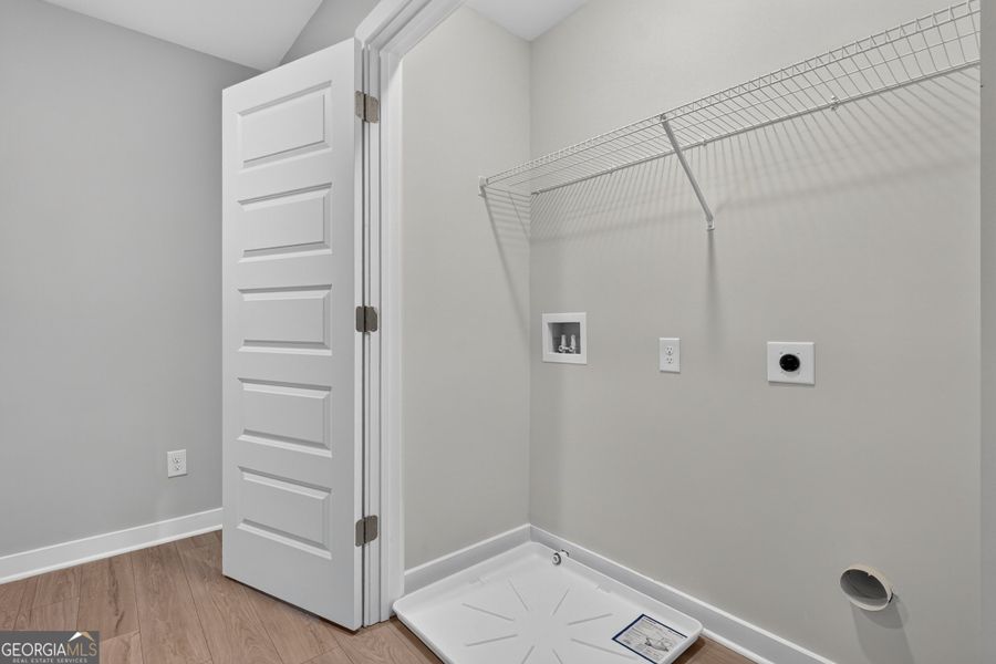 Spacious, unfurnished interior of a new home in The Cottages at East Lanier, Fayetteville (Image 18).