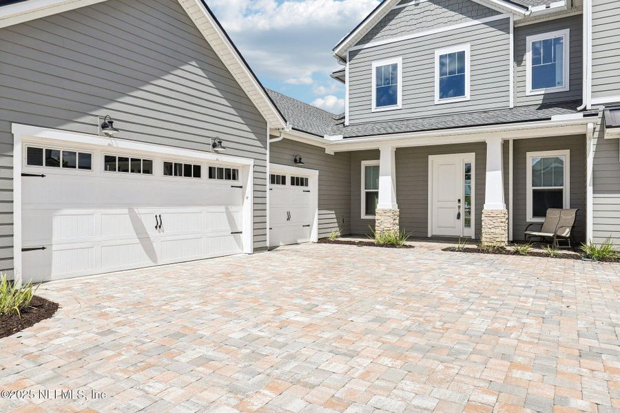 Front exterior of a new home in , St. Augustine, FL, highlighting curb appeal (Image 28).