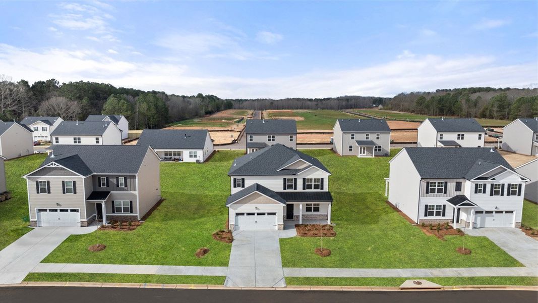 Front exterior of a new home in Estates at Deer Hollow, Grovetown, GA, highlighting curb appeal (Image 23).