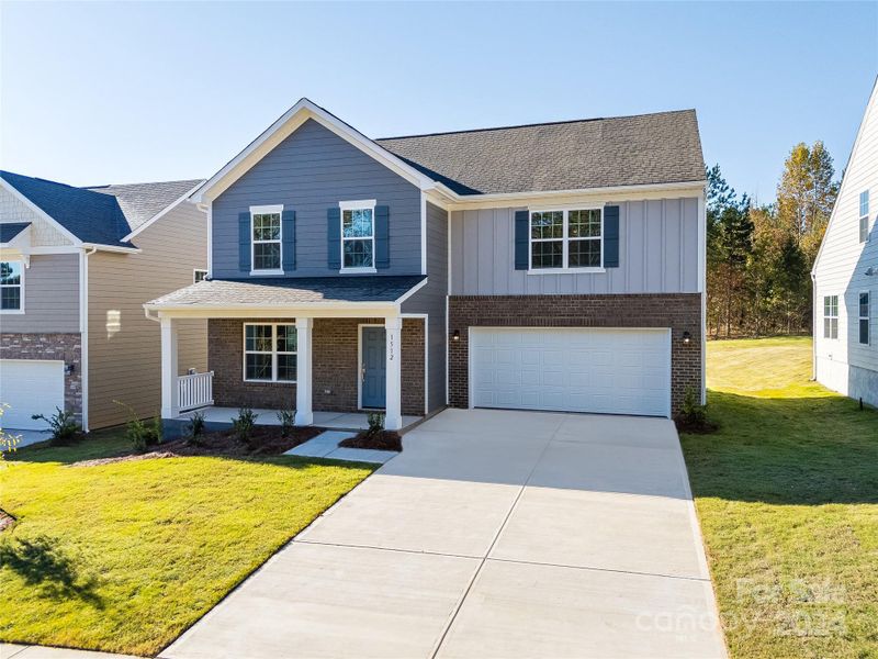 Hardie Plank Exterior w/ Brick Accents