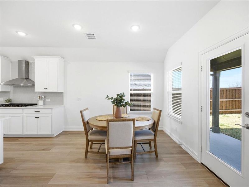Breakfast room view of single story three bedroom home with an office and a formal dining room