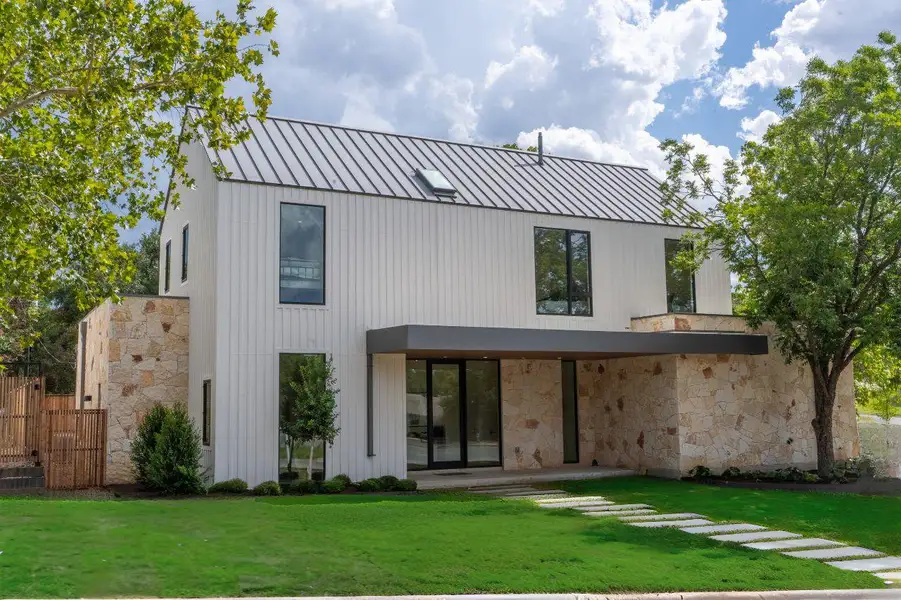 Front exterior of a new home in , Austin, TX, highlighting curb appeal (Image 2). Front exterior of a new home in , Austin, TX, highlighting curb appeal (Image 2).