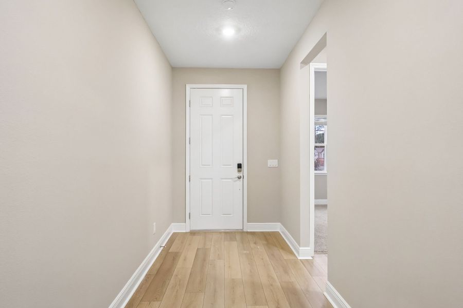 Spacious, unfurnished interior of a new home in Legends Preserve - Signature Series, Daytona Beach (Image 9).