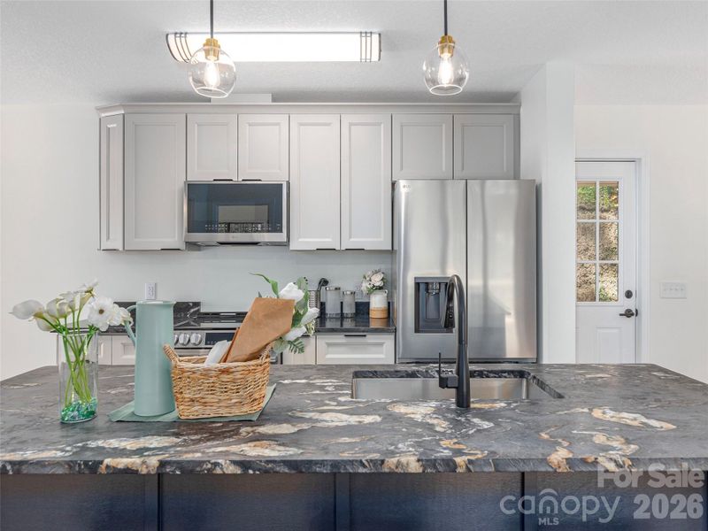 Furnished interior view inside a new home in , Waynesville (Image 12).