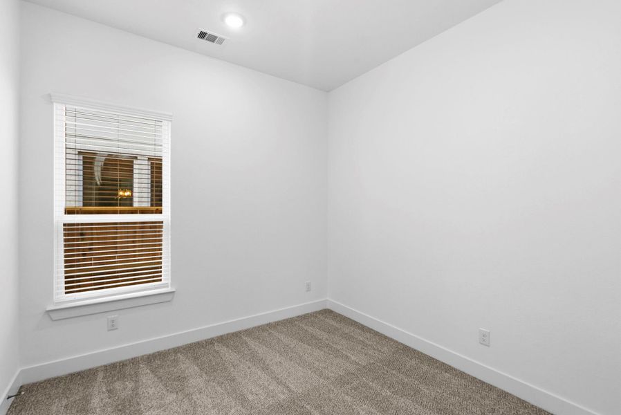 Spacious, unfurnished interior of a new home in Meridiana, Manvel (Image 10).