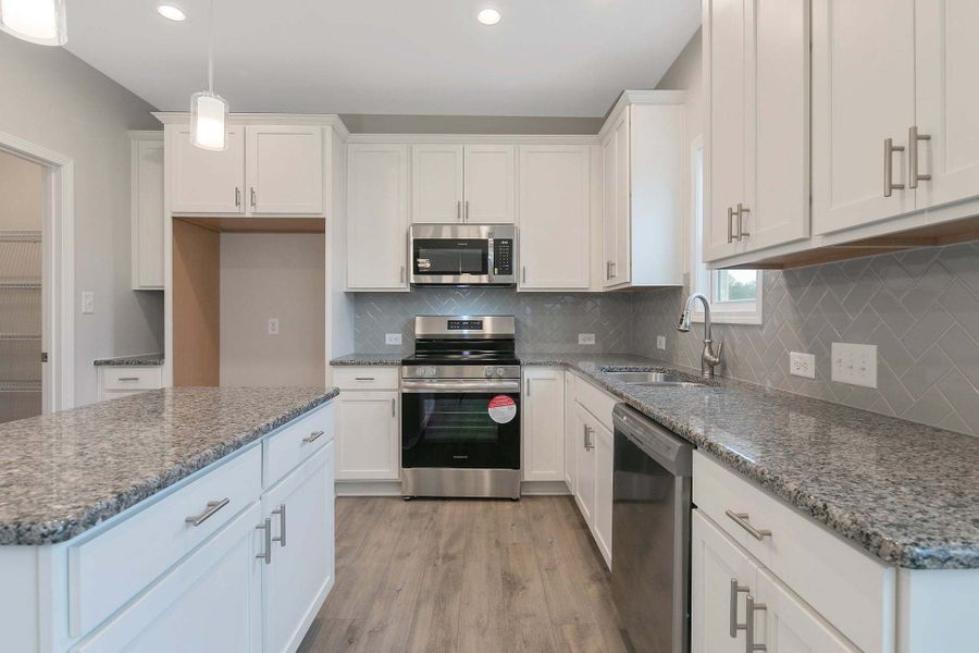 Representative furnished interior of a home built from the Magnolia by Caviness & Cates Communities in Bartlett Manor, Youngsville (Image 160).
