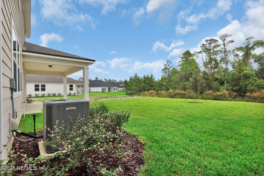 Exterior details and patio area of a home in Hyland Trail, Green Cove Springs (Image 27).