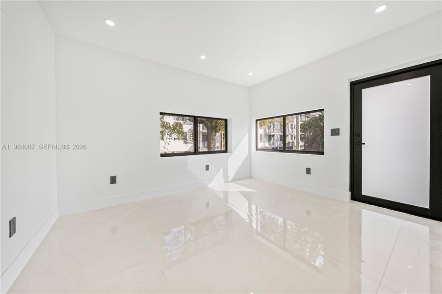 Spacious, unfurnished interior of a new home in , North Miami (Image 59).